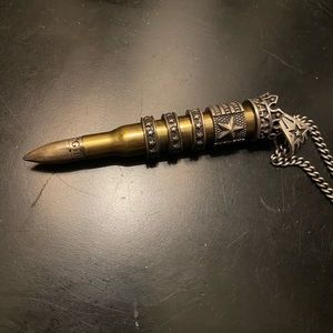New, good condition King Baby bullet necklace. Never worn.
